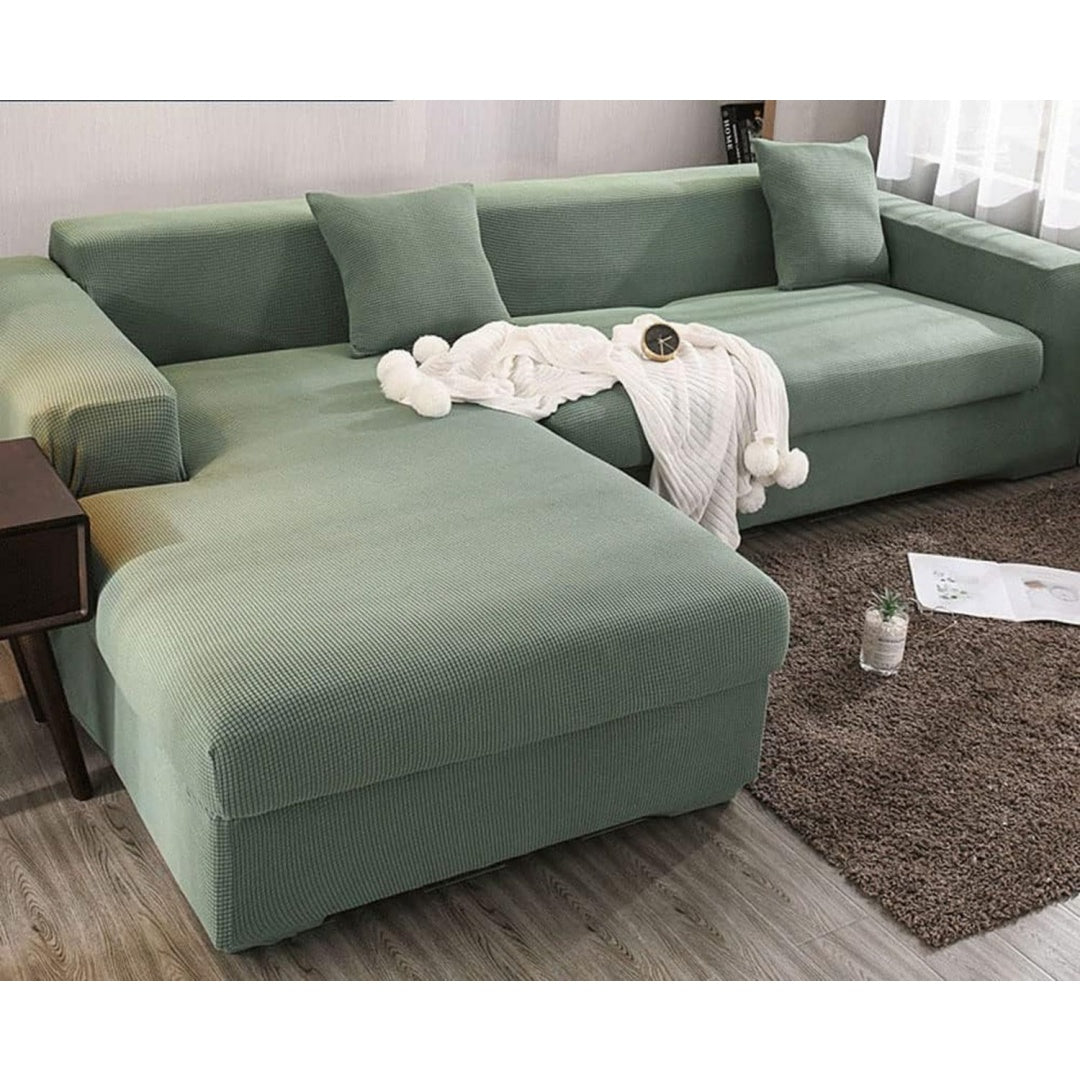 Divano confortevole con braccioli verde